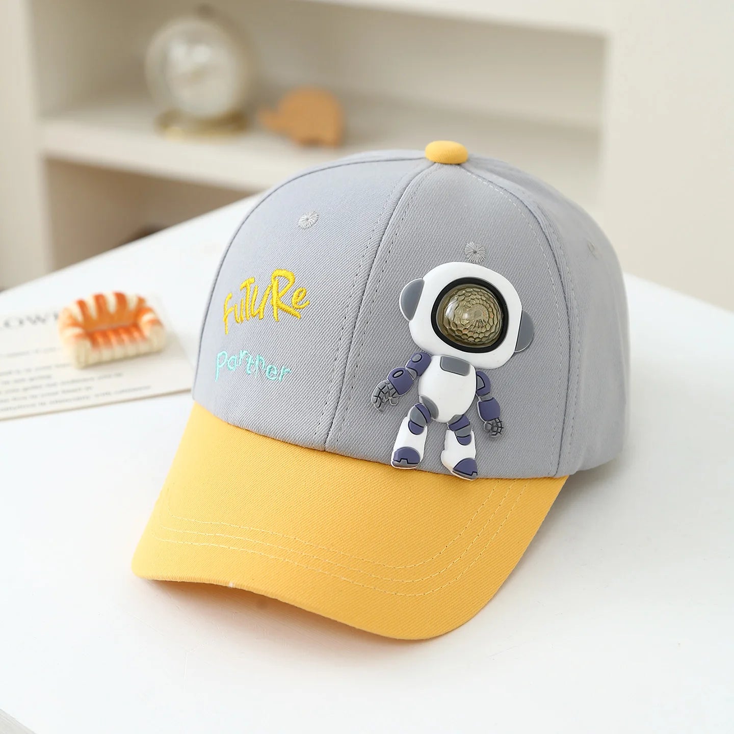 Children's soft rubber robot doll with "Future Partner" colorful letter embroidery contrast baseball cap