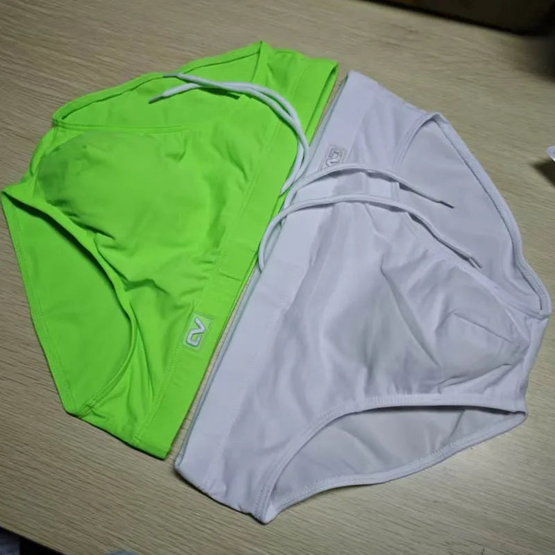 2026Combination trunks men's low-rise briefs solid color nylon swimming trunks cup anti-embarrassment beach pants tethered BS420