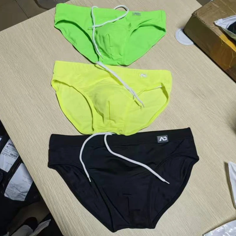 2026Combination trunks men's low-rise briefs solid color nylon swimming trunks cup anti-embarrassment beach pants tethered BS420