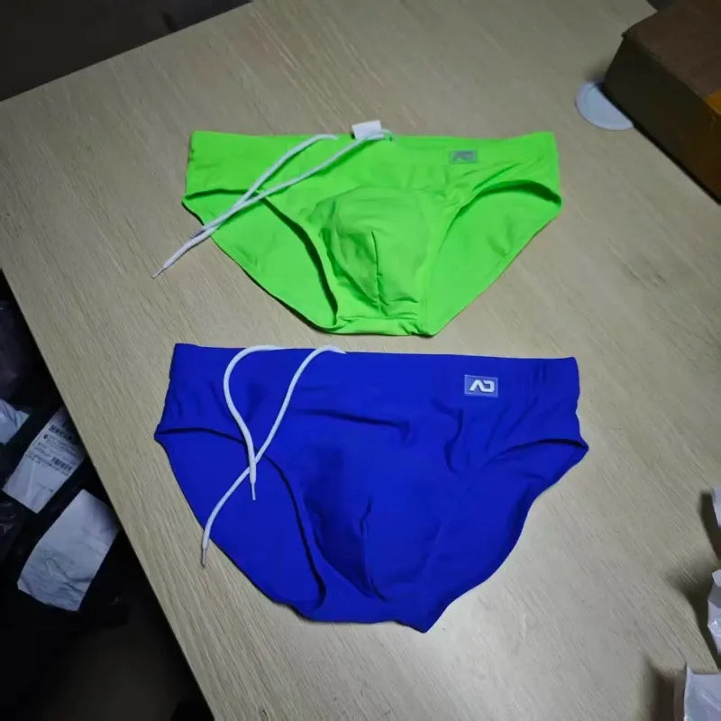 2026Combination trunks men's low-rise briefs solid color nylon swimming trunks cup anti-embarrassment beach pants tethered BS420