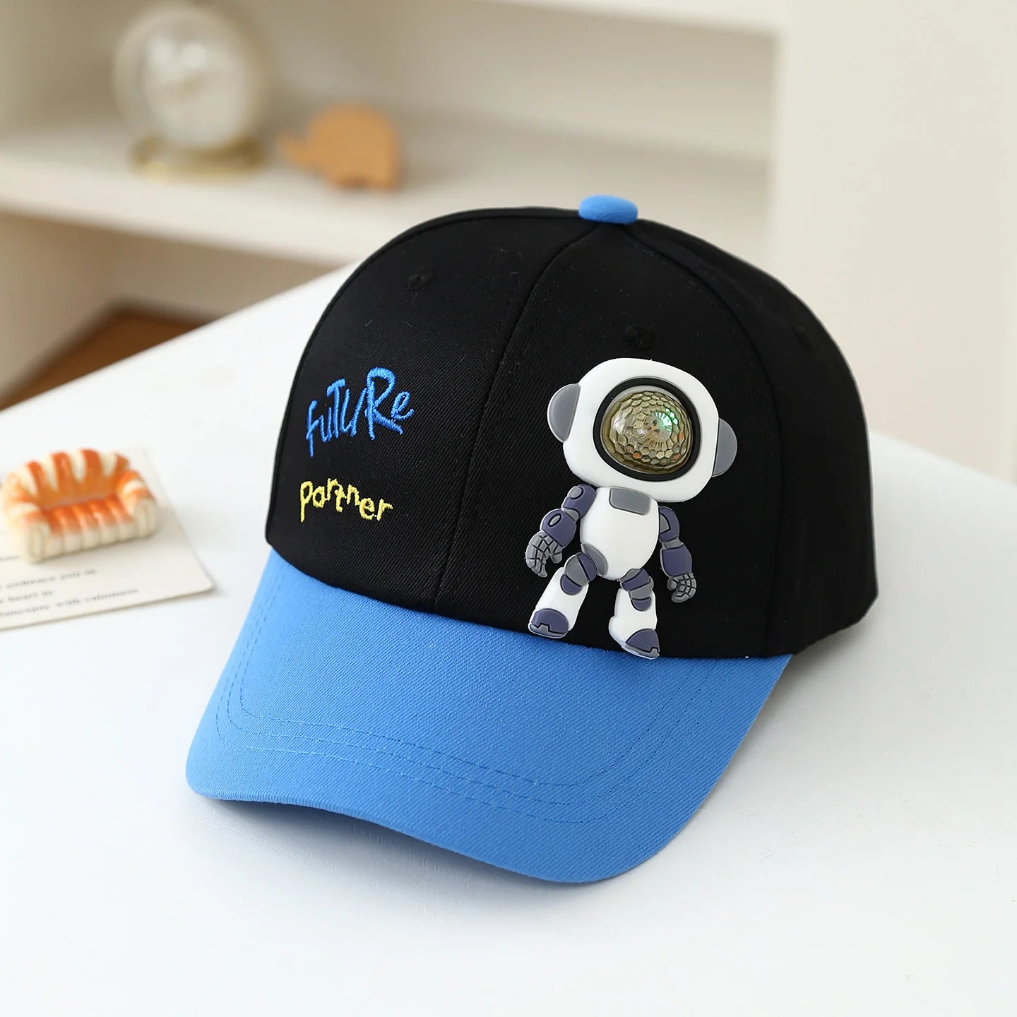 Children's soft rubber robot doll with "Future Partner" colorful letter embroidery contrast baseball cap