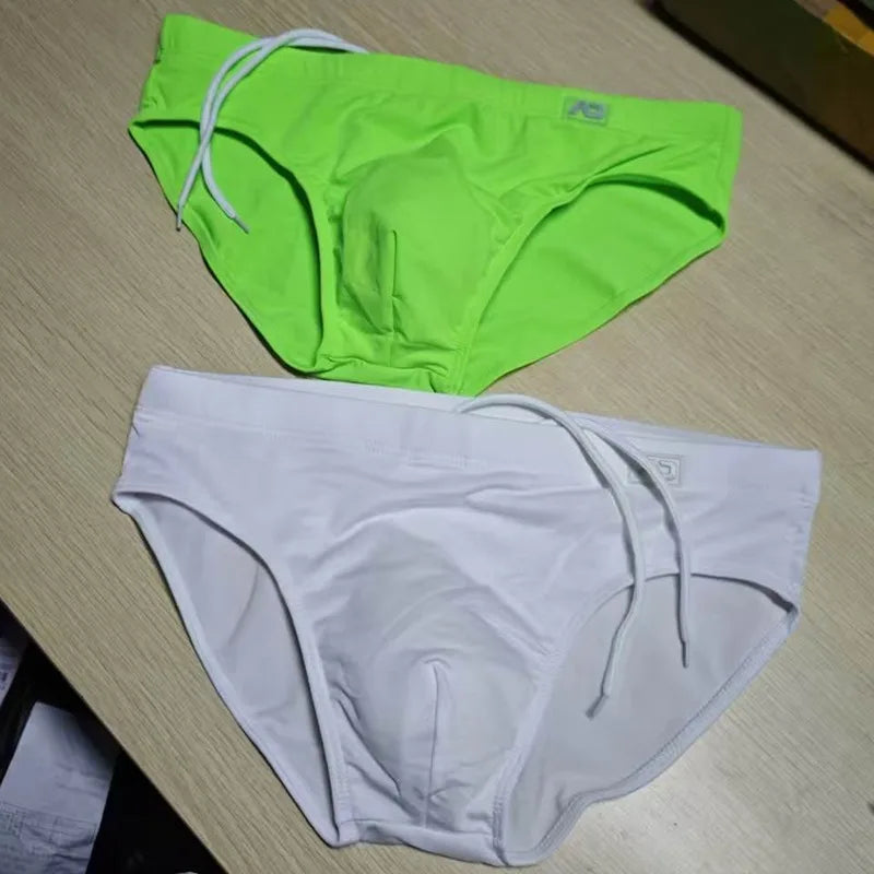 2026Combination trunks men's low-rise briefs solid color nylon swimming trunks cup anti-embarrassment beach pants tethered BS420